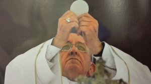 Pope Francis having a "special time" worshipping the idol of the transubstantiated "Christ" in the wafer.